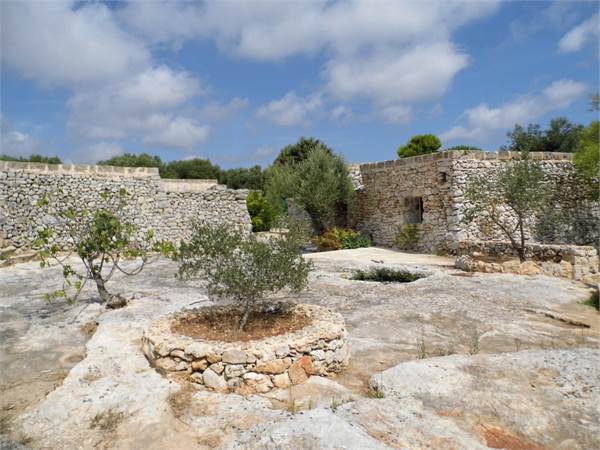 Ancient village in Pozzo Volito, surrounded by gre